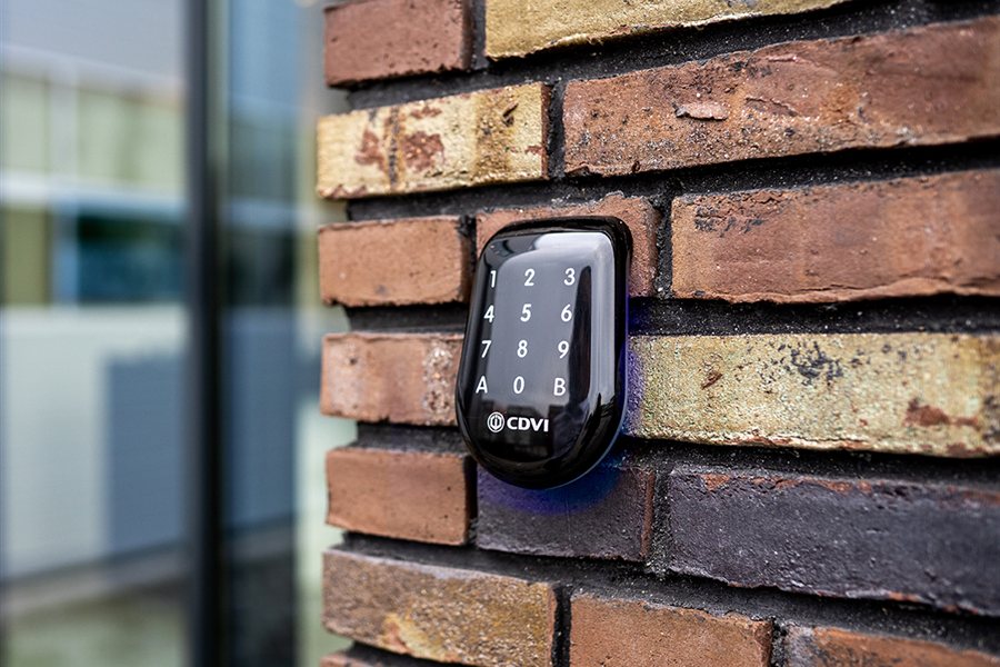 CDVI access control keypad reader on a brick entrance